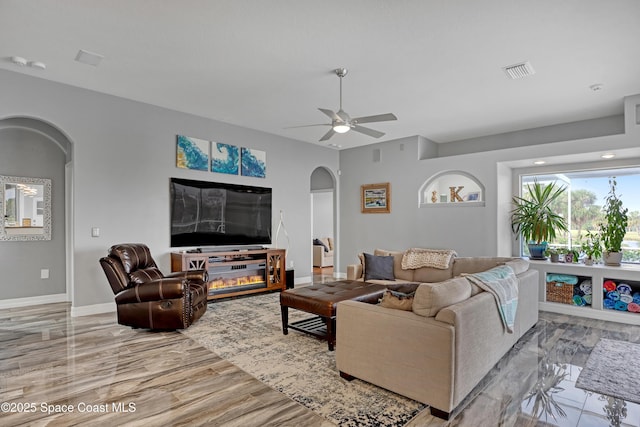 living room with ceiling fan