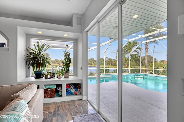 view of pool with a water view