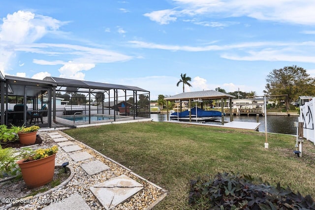 dock area featuring a yard, a lanai, and a water view