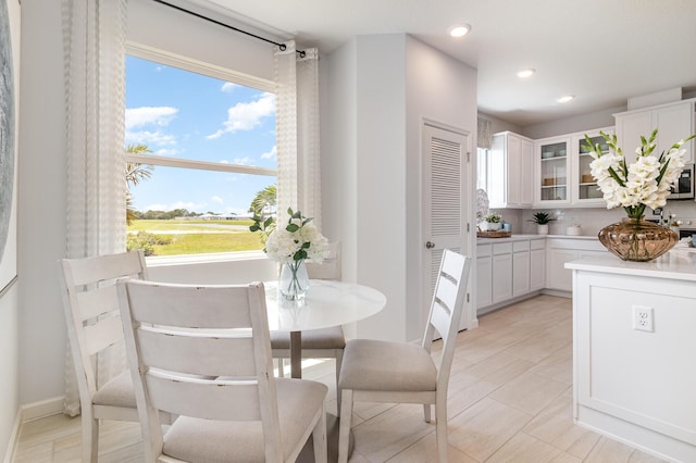 dining space featuring a healthy amount of sunlight