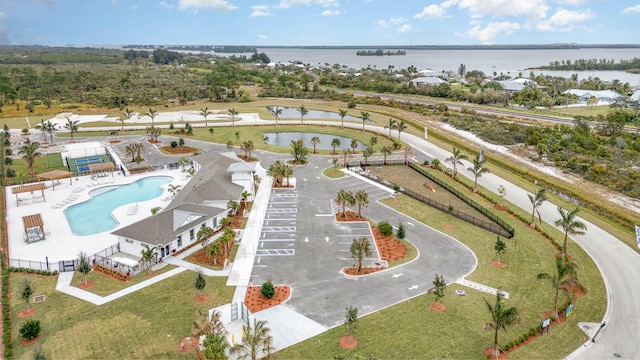 birds eye view of property featuring a water view