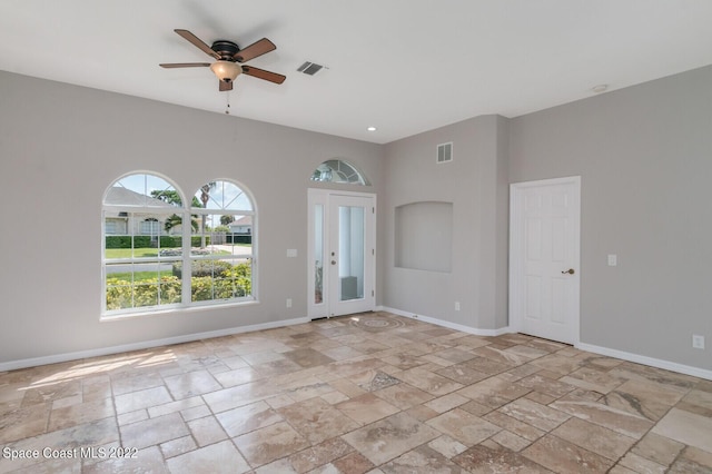 spare room featuring ceiling fan