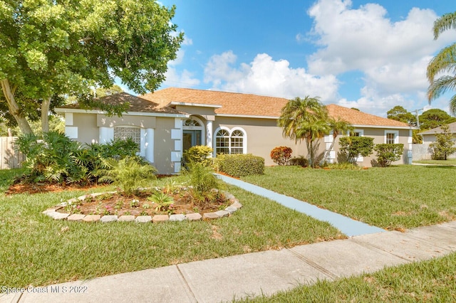 view of front of house with a front yard