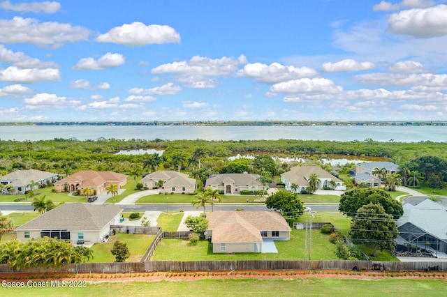 bird's eye view with a water view