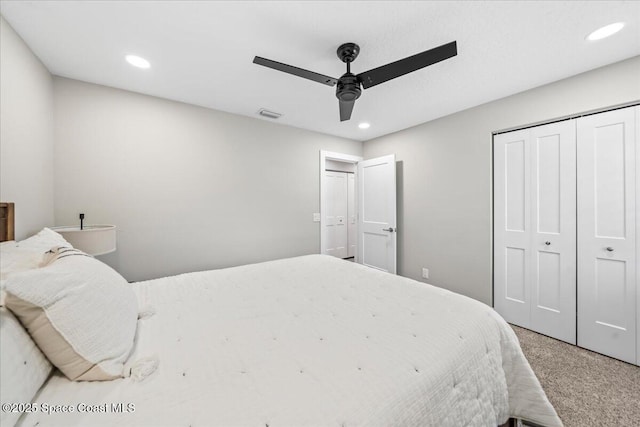 bedroom featuring carpet flooring, a closet, and ceiling fan