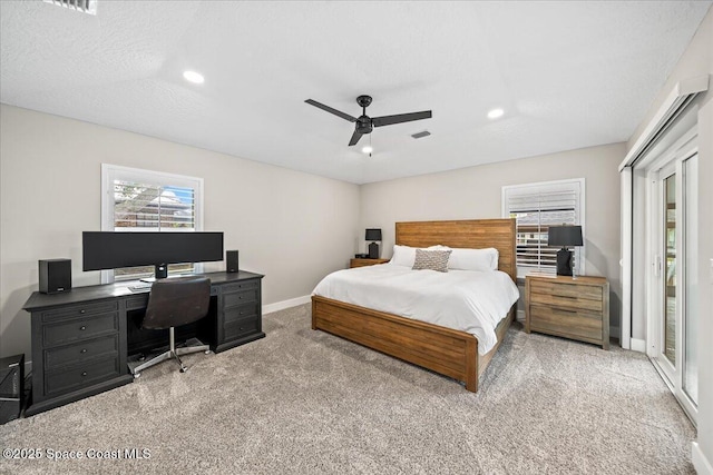 bedroom with light carpet, access to exterior, a textured ceiling, and ceiling fan