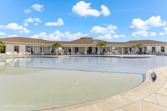 view of pool featuring a patio