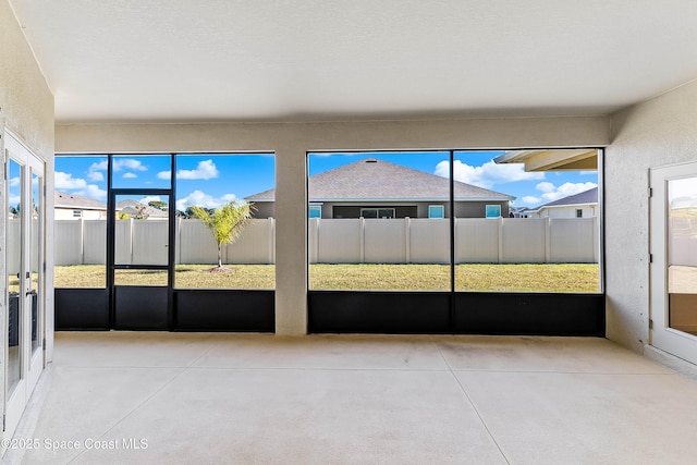 view of unfurnished sunroom