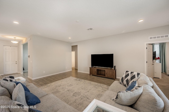 living room with hardwood / wood-style floors