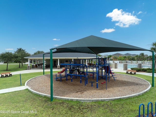 view of playground with a yard