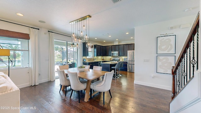 dining room featuring dark hardwood / wood-style floors