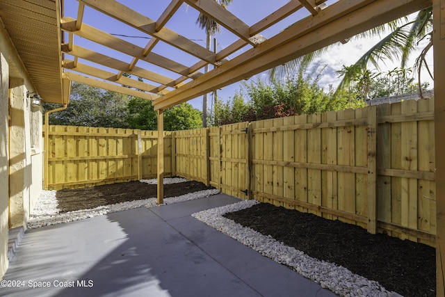 view of patio featuring a pergola