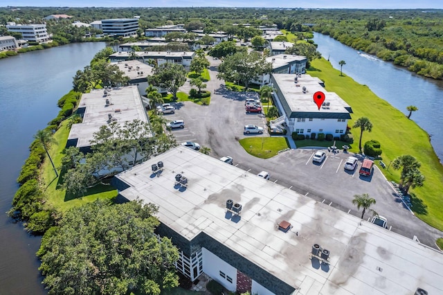 bird's eye view with a water view