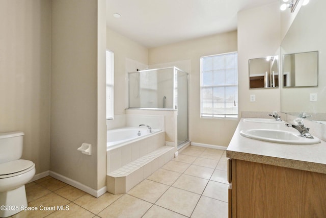 full bathroom featuring toilet, tile patterned floors, separate shower and tub, and vanity