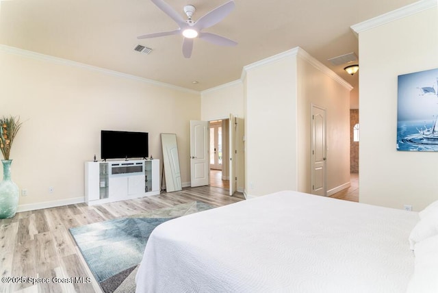 bedroom with ceiling fan, ornamental molding, and light wood-type flooring