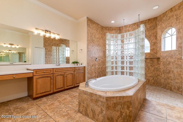 bathroom with vanity, tile patterned flooring, ornamental molding, and shower with separate bathtub