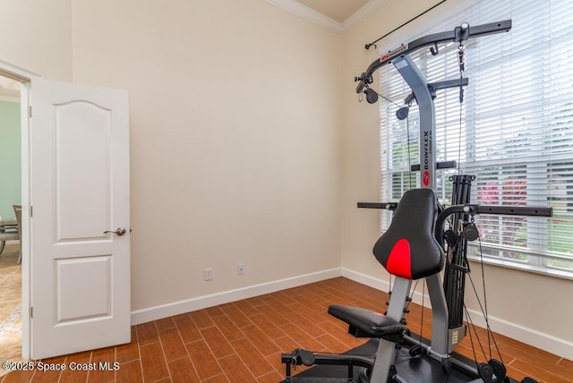 workout area with crown molding