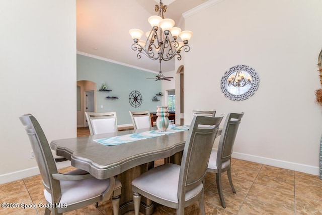 dining room with ceiling fan with notable chandelier, a high ceiling, and ornamental molding