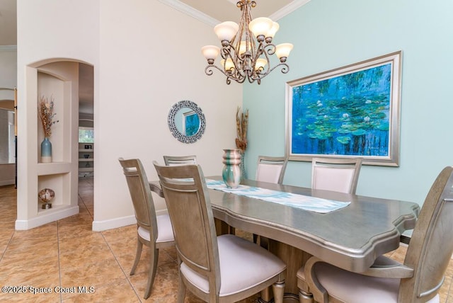 dining space featuring built in shelves, a notable chandelier, and ornamental molding