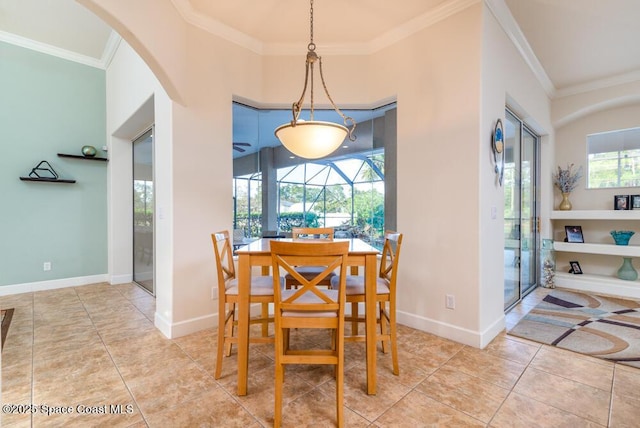 tiled dining area featuring ornamental molding