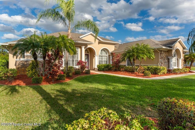 view of front of home with a front yard