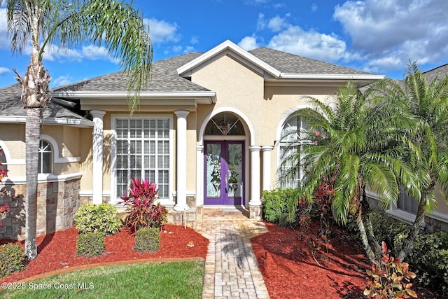 view of exterior entry with french doors