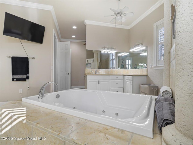 bathroom featuring vanity, tiled bath, ceiling fan, and ornamental molding