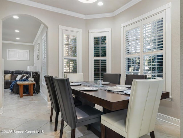 tiled dining area with crown molding