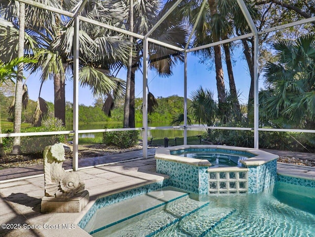 view of swimming pool featuring a lanai, an in ground hot tub, and a water view