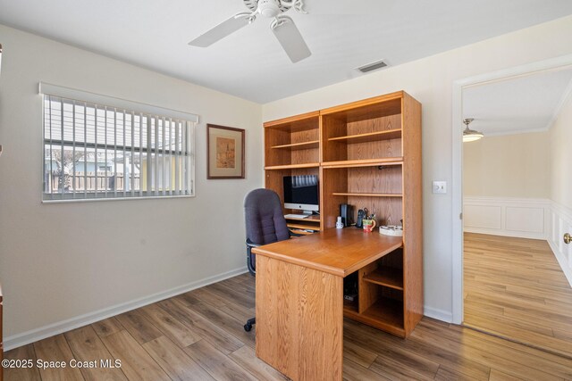 home office featuring ceiling fan and hardwood / wood-style floors