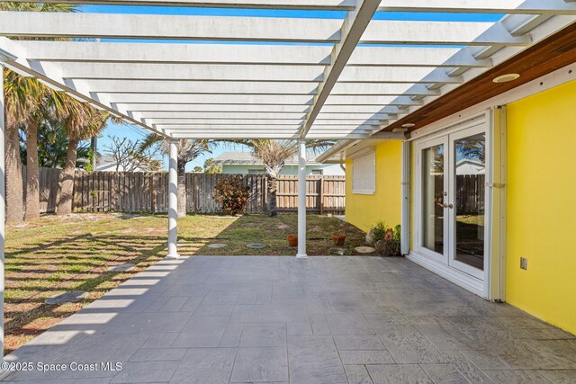 view of patio / terrace featuring a pergola and french doors