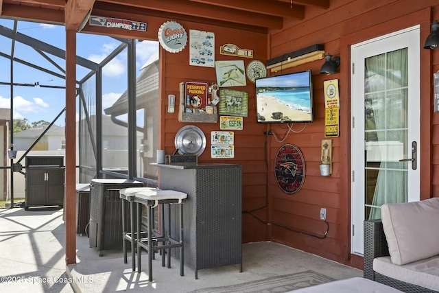 bar with beam ceiling and wooden walls