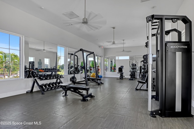 exercise room with ceiling fan