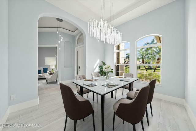 dining area with a notable chandelier