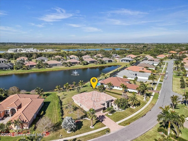 aerial view featuring a water view