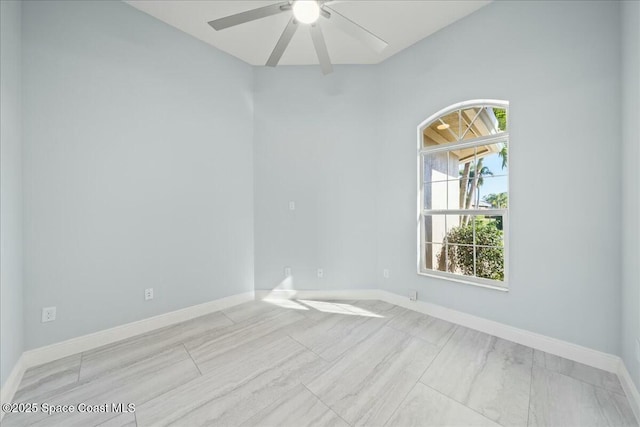 unfurnished room with ceiling fan