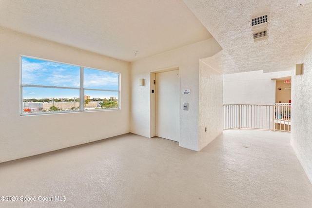 empty room featuring elevator