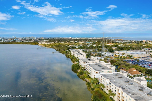 drone / aerial view with a water view