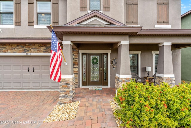 property entrance with a garage