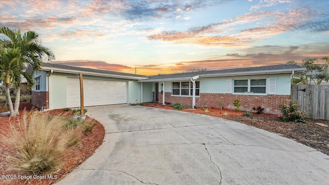 single story home with a garage