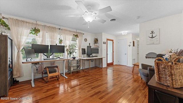 office featuring ceiling fan and hardwood / wood-style floors