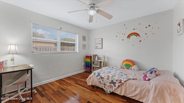 bedroom featuring dark wood-type flooring and ceiling fan