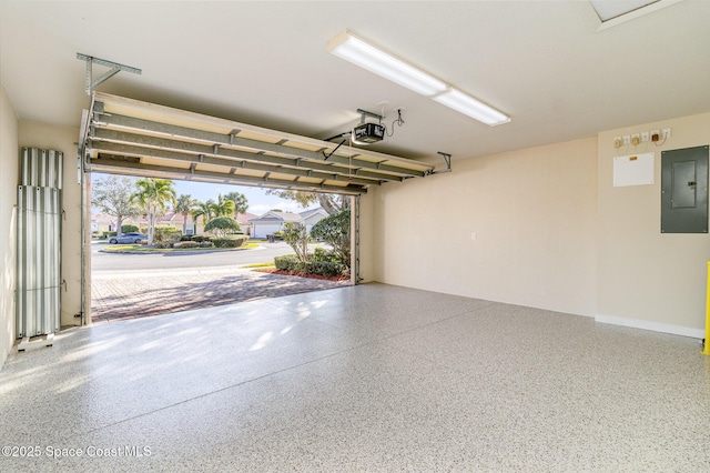 garage with electric panel and a garage door opener