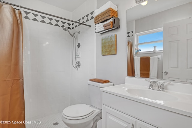 bathroom with walk in shower, vanity, and toilet