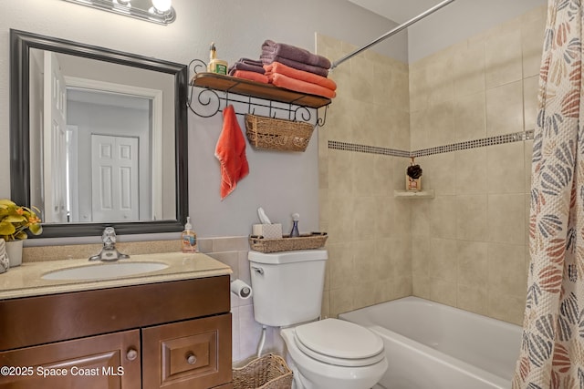 full bathroom with toilet, vanity, and shower / bath combo with shower curtain