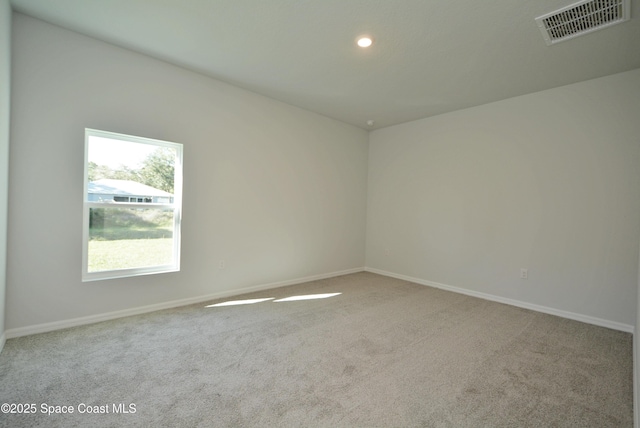 view of carpeted spare room