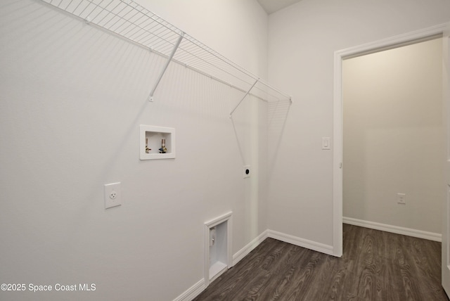 laundry area featuring hookup for a washing machine, dark hardwood / wood-style floors, and electric dryer hookup