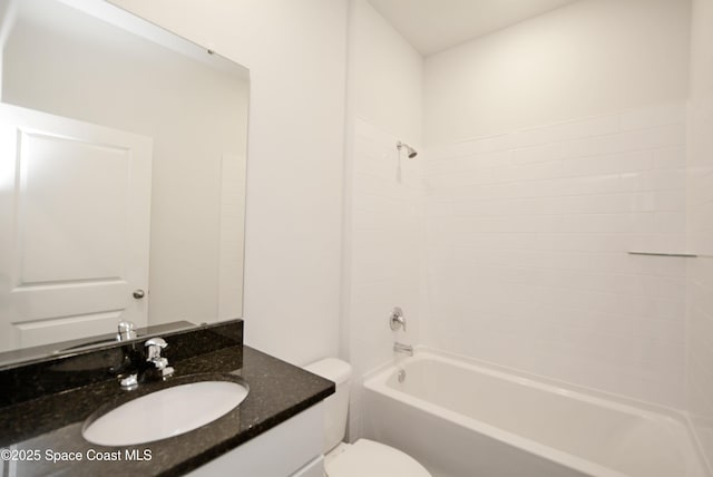 full bathroom featuring toilet, vanity, and bathing tub / shower combination