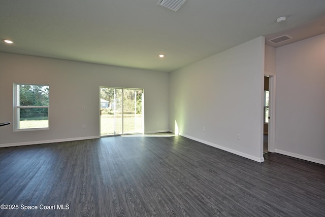 empty room featuring dark hardwood / wood-style floors