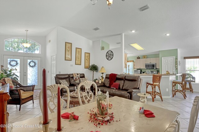 tiled dining room with french doors